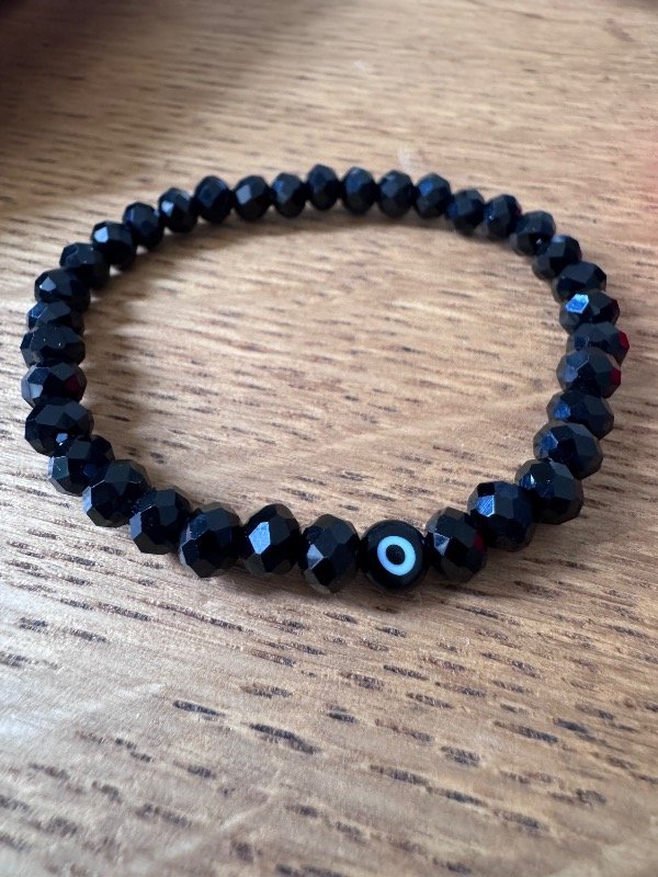 Producto - Pulsera cristal con ojito negro