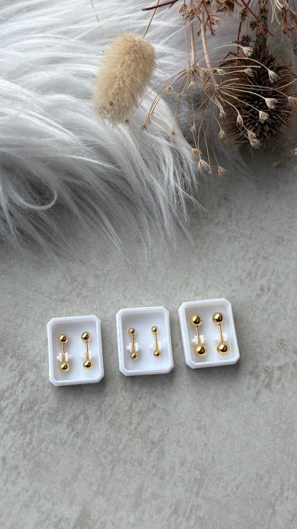 Producto - Abridores de acero dorado l