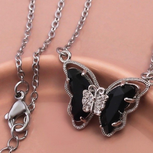 Producto - Co. Mariposa con relieve color negro