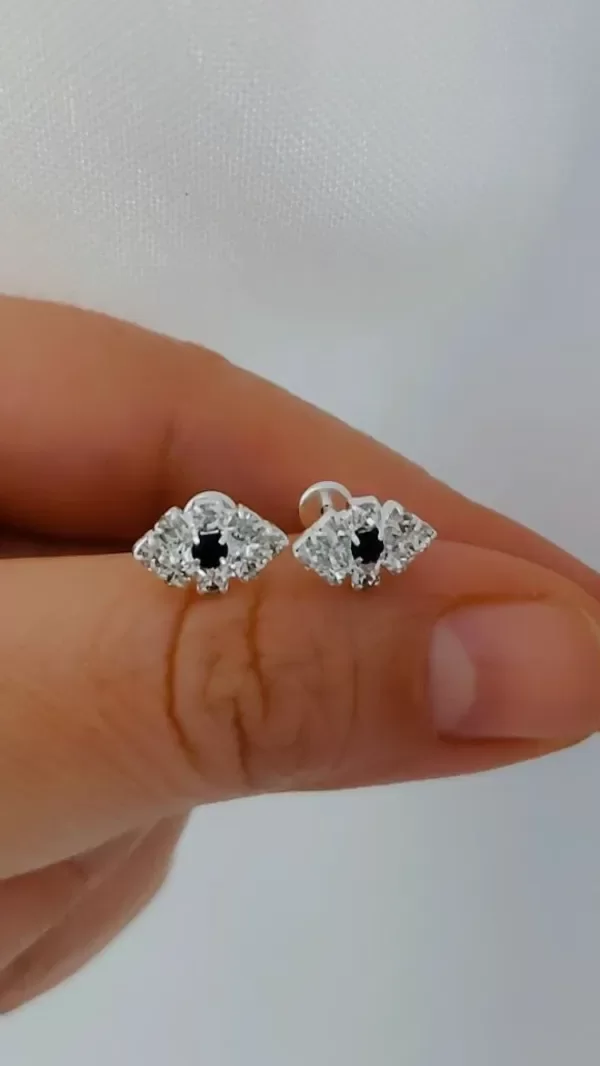 Producto - Abridor ojito Cubic blanco negro