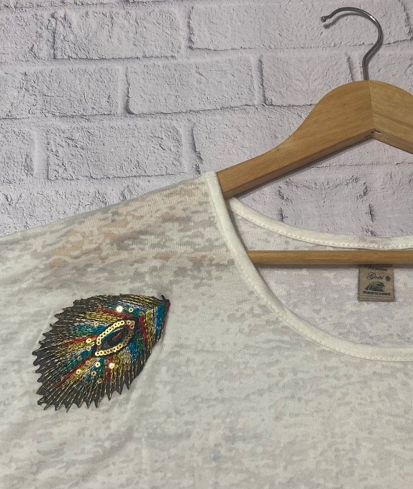 Producto - Remera Exclusiva Pluma colores.Calce suelto