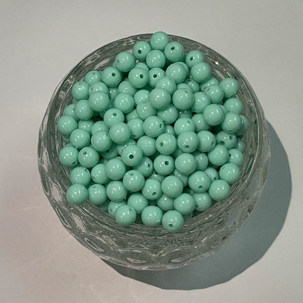 Producto - PERLA VERDE AGUA PLASTICA 6mm X25g
