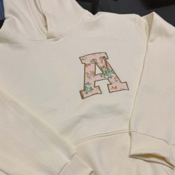 Producto - Canguro Oversize bordado con la ropita de tu bebe - INICIAL