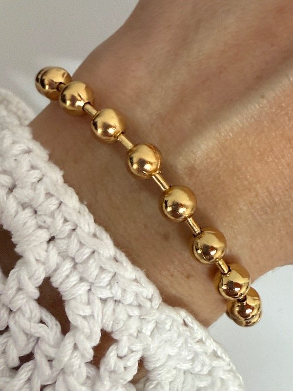 Producto - PD108 Pulsera bolitas acero dorado 18 cm