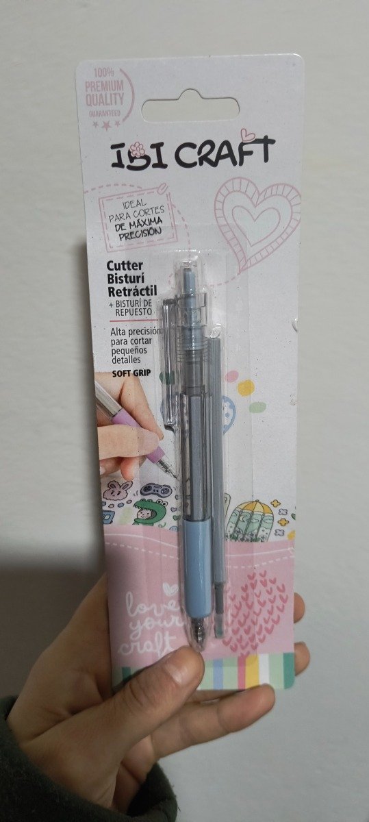 Producto - Cutter bisturí retractil con repuesto celeste