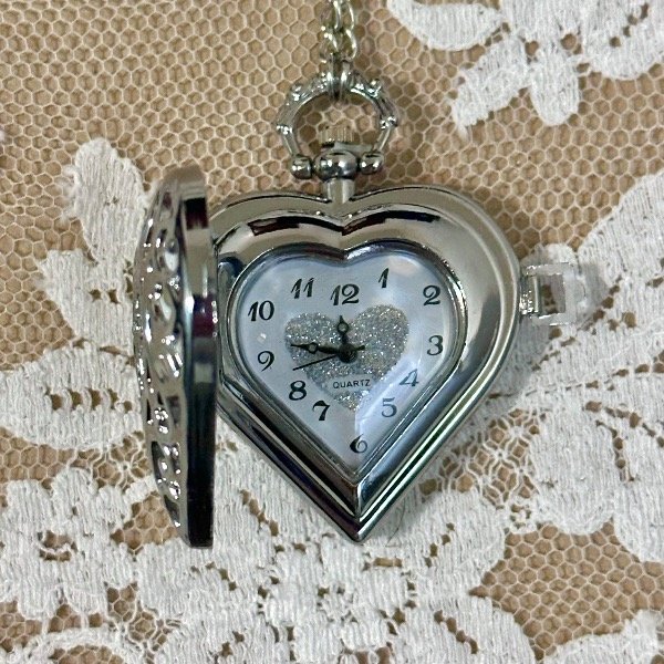 Producto - reloj relicario plateado - 1