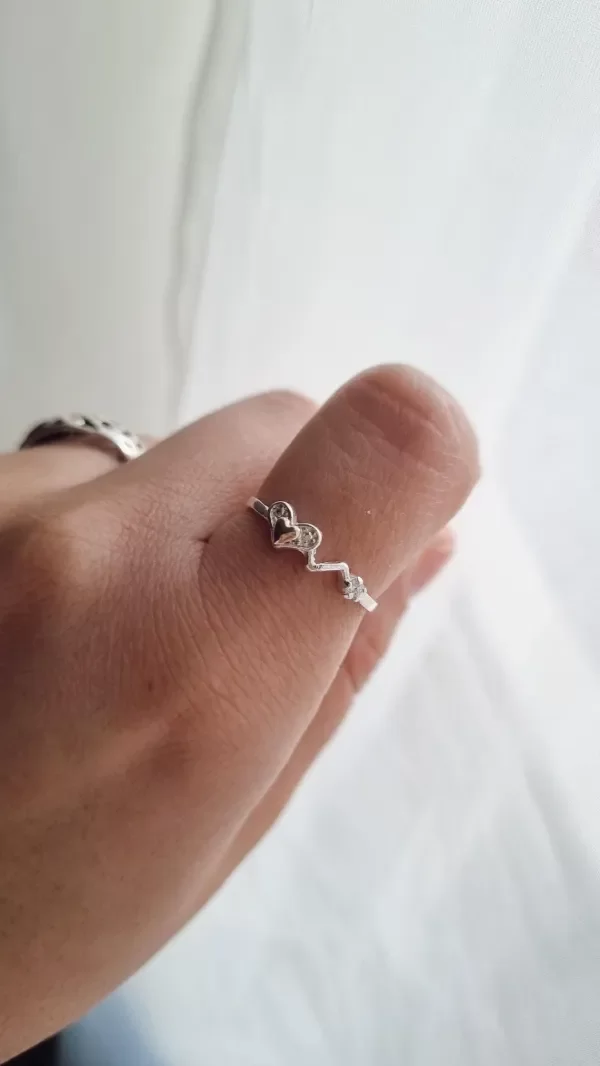 Producto - Anillo cora con latido plata y oro
