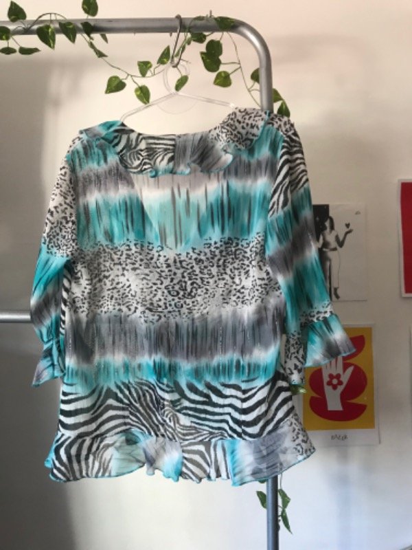 Blusa animal print — imagen 4
