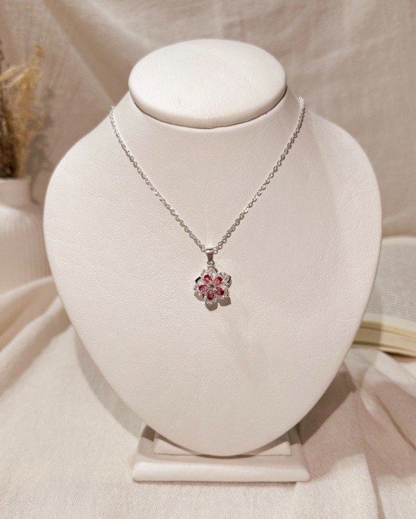 Producto - Collar flor giratoria fucsia
