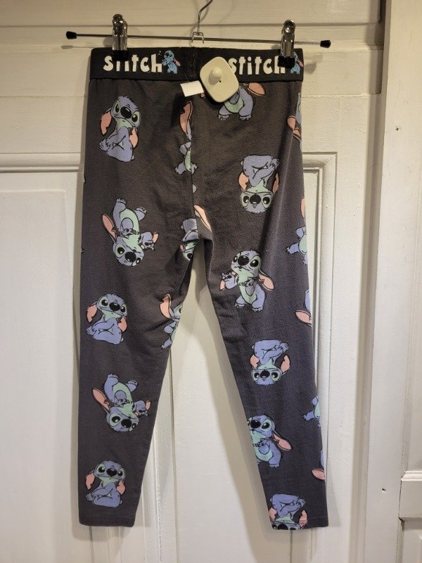 Producto - Calza PRIMARK gris logo stitch Talle 9/10 años- PRECIO: 12X - 1