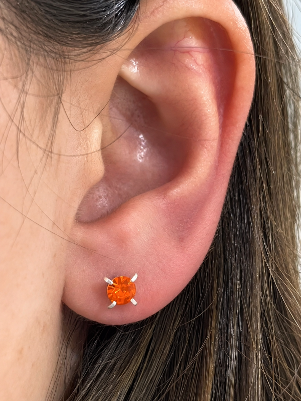 Producto - Abridor de plata laminada con piedra naranja