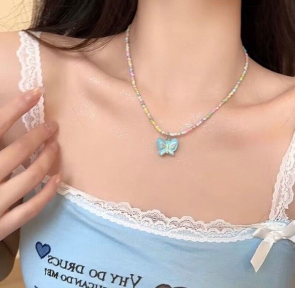 Producto - Collar mariposa celeste importado