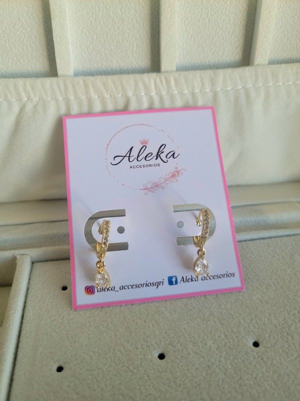 Producto - Argollas micropave con cubic gota de acero dorado