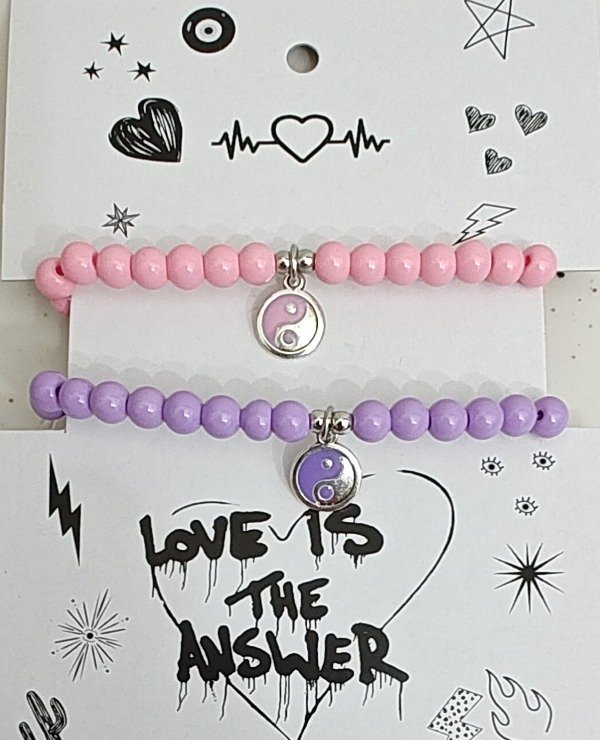 Producto - Pulseras para compartir piedras lila y rosa con dijes Ying y Yang Esmaltados