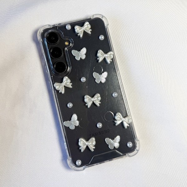 Producto - Charms moños y flores blancas