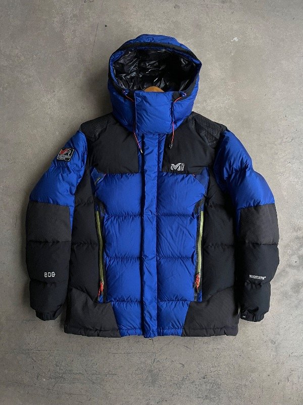 Producto - CAMPERON RELLENO DE PLUMAS MILLET 800 WINDSTOPPER AZUL Y NEGRO (XL)(106)