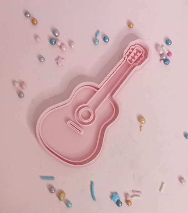 Producto - Cortante 3D con sello de guitarra