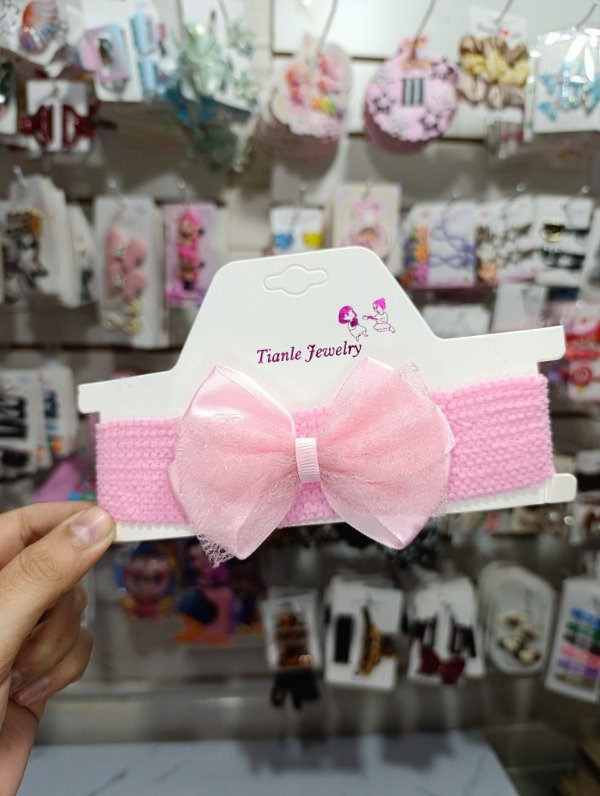 Producto - Vinchas de bebé rosas con moño x1