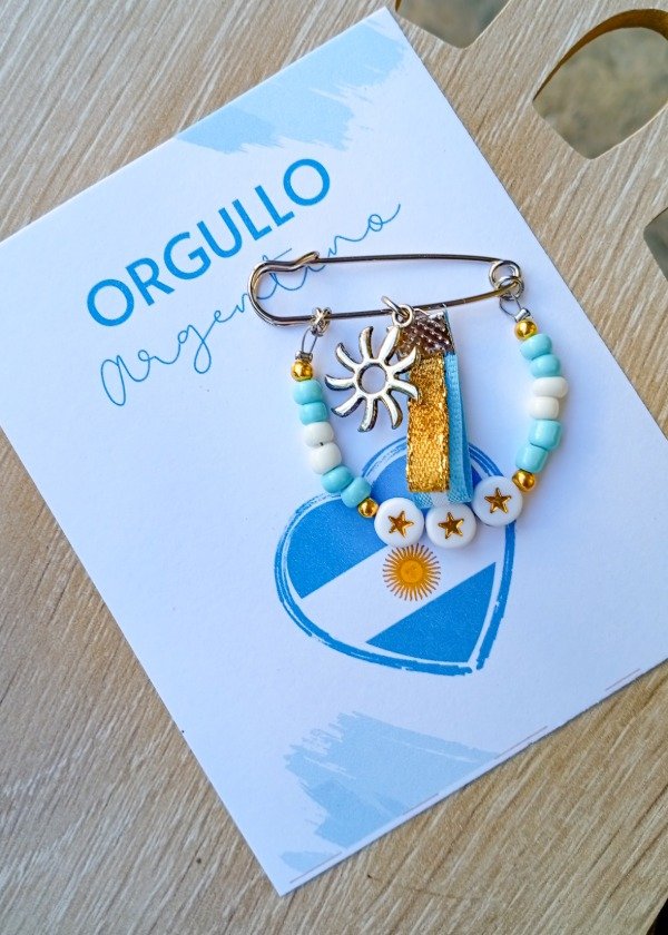 Producto - Escarapela solcito III