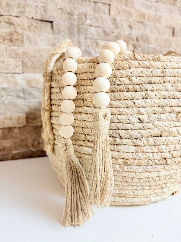 Producto - Guirnalda de madera con borlas de yute 64cm