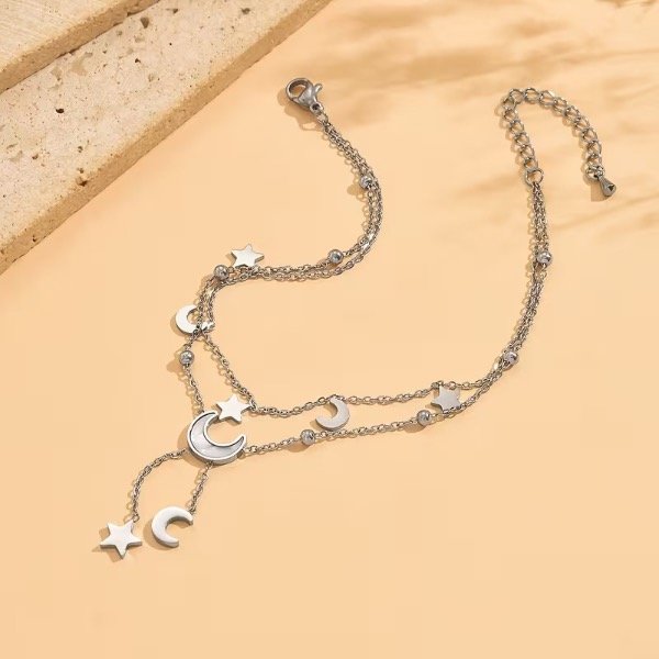 Producto - Tobillera multicapa plata con dijes de lunas y estrellas - 1