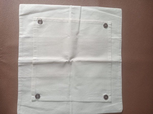 Producto - Funda almohadon de lienzo con parche