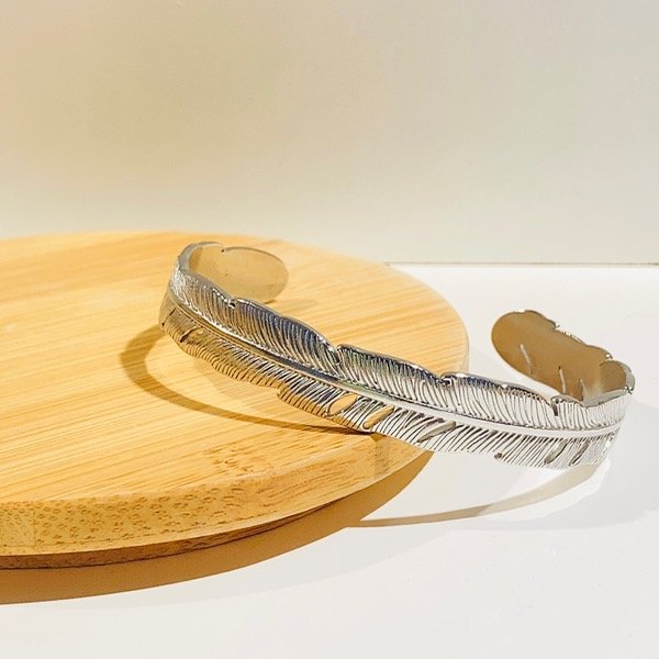 Producto - Esclavas Pluma