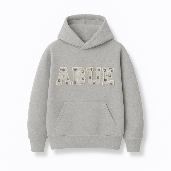 Producto - Canguro Oversize bordado con la ropita de tu bebe - ABUE