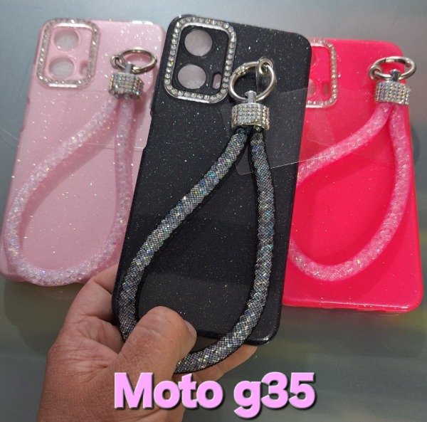 Producto - Fundas brillo epoxy con correa strass. Moto g35