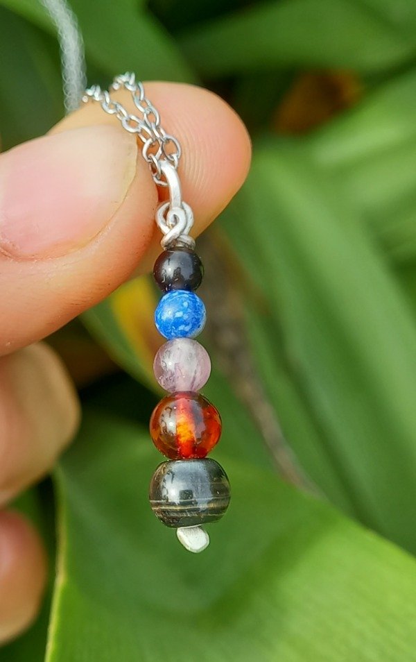 Producto - Pendulo de Ojo de Halcon, ambar, amatista, lapis y obsidiana