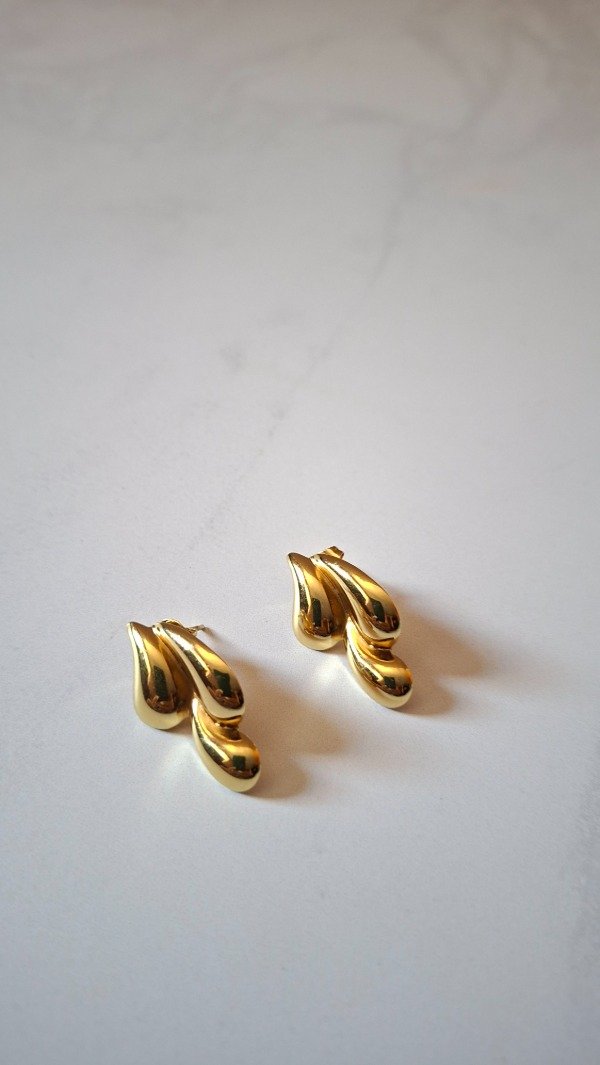 Producto - Aros de acero dorado tres gotas