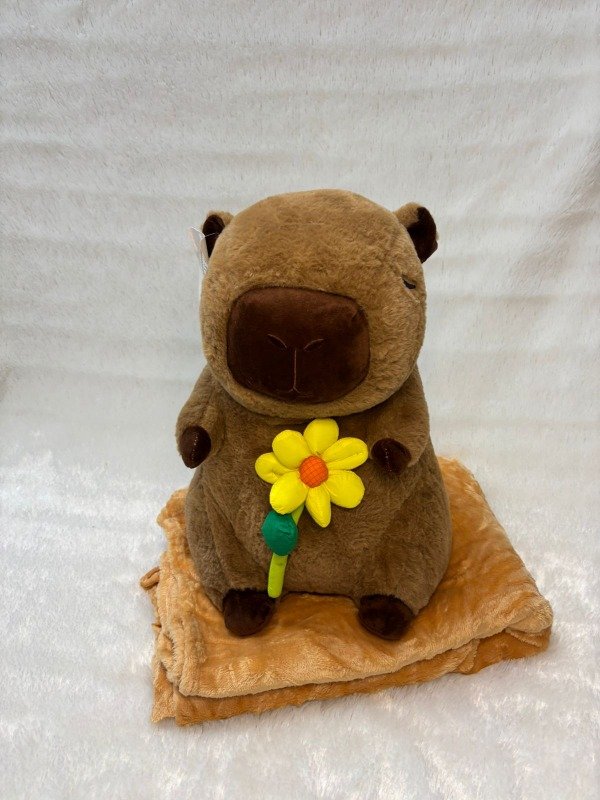 Producto - Peluche capibara con flor amarilla 3 en 1