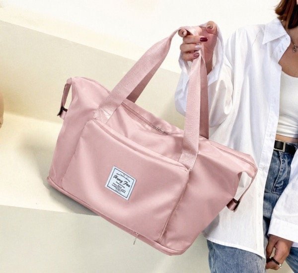 Producto - Bolso IMPERMEABLE EXTENSIBLE - ROSA