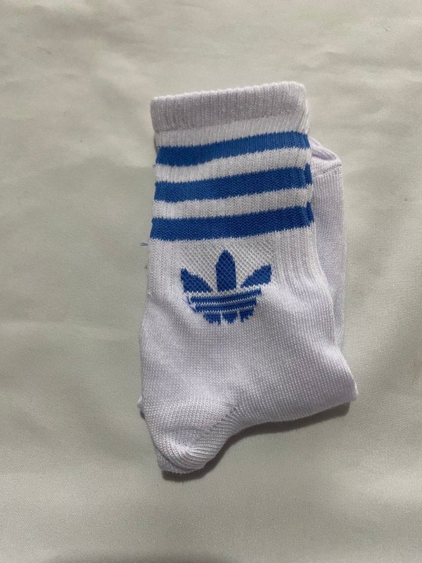 Producto - Adidas blanco y azul