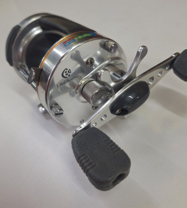 Producto - Reel rotativo Bando CB50 con chicharra