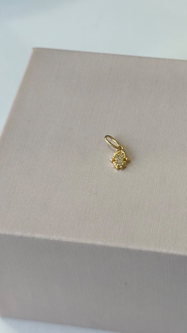 Producto - Dije nenita laminado en oro 18k