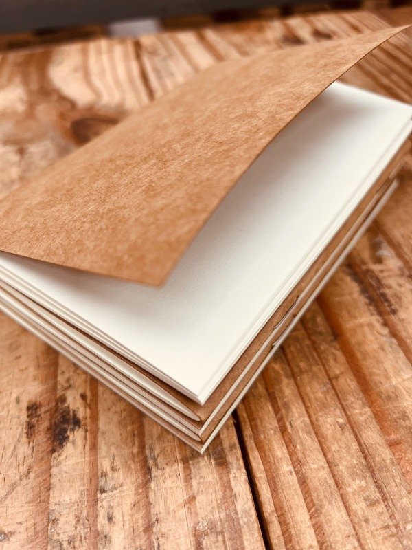 Producto - CUADERNO ABROCHADO LISO A6 x 10 UN. - 2