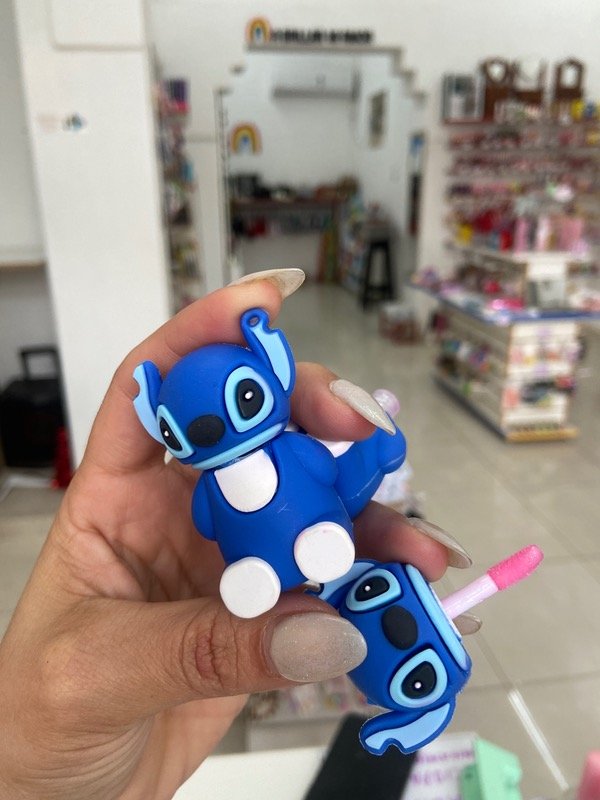 Producto - GLOSS STICH MUÑEQUITO