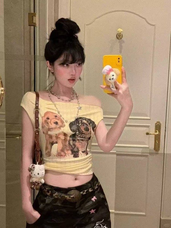 Producto - Remera amarilla de perritos