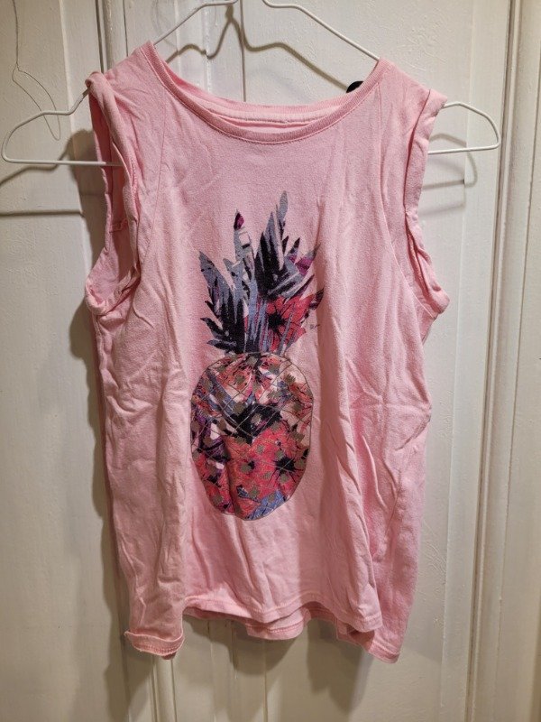 Producto - Musculosa WANAMA rosa logo ananá Talle 10 años - PRECIO: 11X