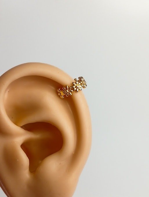Producto - Aro cuff florcitas - Acero dorado