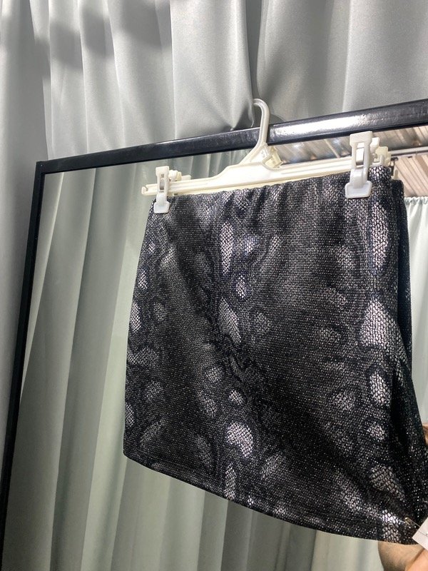 Producto - Pollera reptil