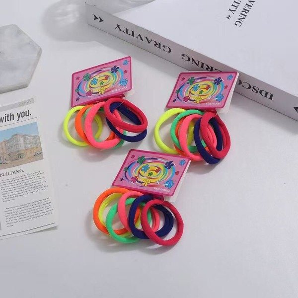 Producto - Docena Colitas de pelo