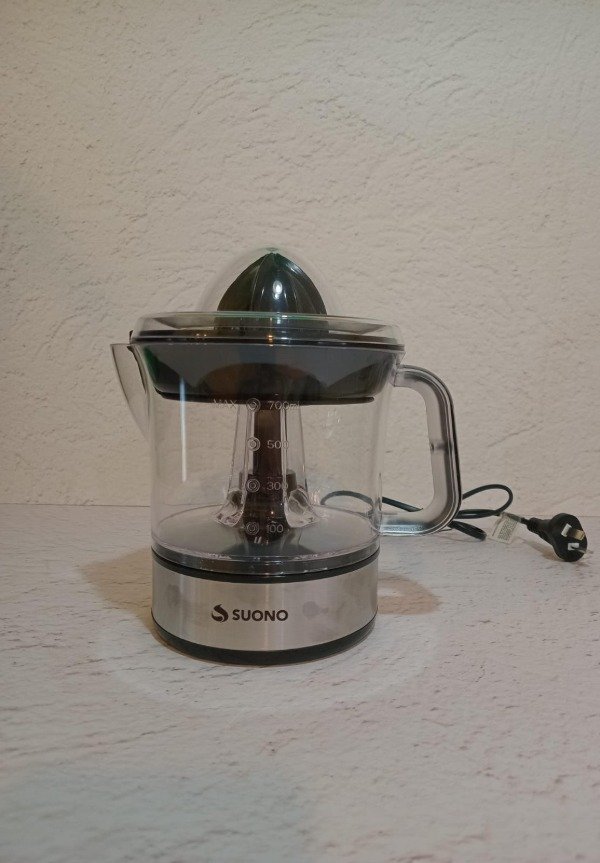 Producto - Exprimidor electrico