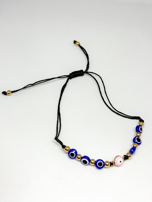 Producto - Pulsera de hilo y ojos (central rosa)