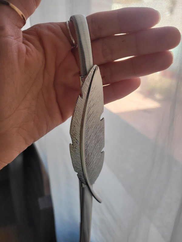 Producto - Cinto elastizado pluma metal plateado