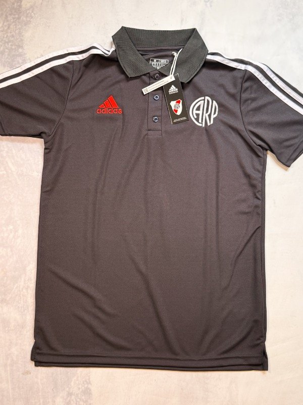 Producto - Chomba gris CARP