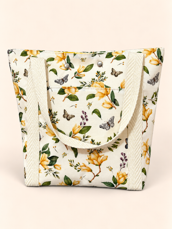 Producto - Bolso floreado con broches y bolsillo