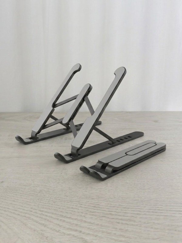 Producto - SOPORTE PLÁSTICO DE NOTEBOOK O TABLET PARA ESCRITORIO - REGULABLE PLEGABLE