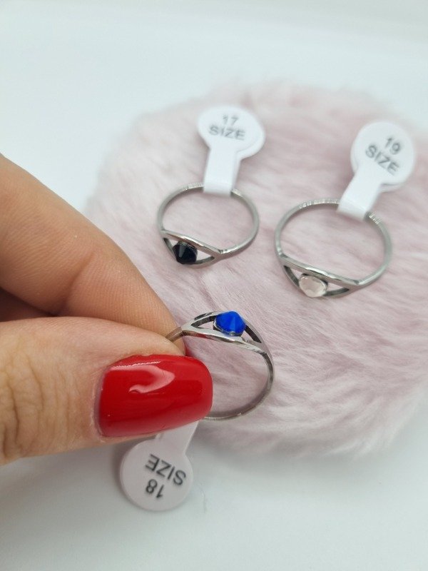 Producto - Anillos acero quirúrgico x3 surt ojo strass color